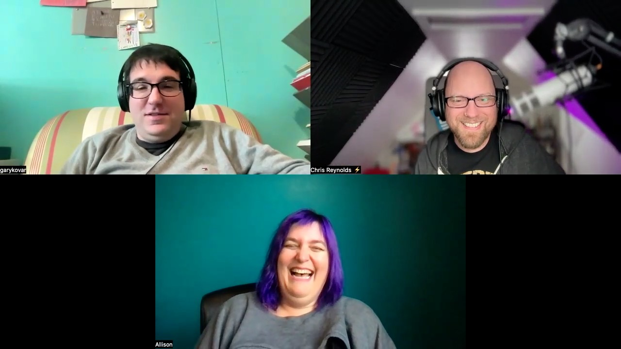 A screenshot from Binary Jazz featuring the three hosts. On the top left, Gary is sitting in a striped chair and wearing headphones with a light blue wall and a noticeboard in the background. The top right shows Chris with a beaming smile, wearing headphones and a black t-shirt in a room with slanted ceilings and soundproofing panels. The bottom center features Allison with vibrant purple hair and a grey top, laughing joyously. The background for all three is a simple, uncluttered indoor setting.